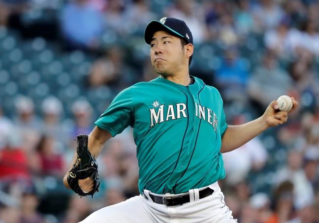 Seattle Mariners starting pitcher Yusei Kikuchi throws against the Detroit Tigers during the first inning of a baseball game, Friday, July 26, 2019, in Seattle. (AP Photo/Ted S. Warren)