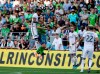Portland Timbers defender Julio Cascante, left, heads the ball above Seattle Sounders forward Nicolas Lodeiro during the first half of an MLS soccer match, Sunday, July 21, 2019, in Seattle. (AP Photo/Ted S. Warren)