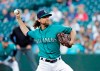 Seattle Mariners starting pitcher Mike Leake throws against the Los Angeles Angels during the first inning of a baseball game, Friday, July 19, 2019, in Seattle. (AP Photo/Ted S. Warren)