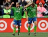 Seattle Sounders forward Jordan Morris, right, is greeted by midfielder Nicolas Lodeiro after Morris scored the first of his two first-half goals against FC Cincinnati during an MLS soccer match Saturday, March 2, 2019, in Seattle. Lodeiro assisted on the goal. (AP Photo/Ted S. Warren)