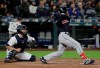 Cleveland Indians' Mike Freeman follows through on an RBI single during the seventh inning of the team's baseball game against the Seattle Mariners, Tuesday, April 16, 2019, in Seattle. (AP Photo/Ted S. Warren)