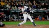 Seattle Mariners' Ryon Healy strikes out swinging with two men on base in the fifth inning of a baseball game against the Cleveland Indians, Monday, April 15, 2019, in Seattle. (AP Photo/Ted S. Warren)