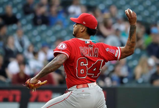 Los Angeles Angels pitcher Felix Pena throws to a Seattle Mariners batter during the second inning of a baseball game Thursday, May 30, 2019, in Seattle. (AP Photo/Ted S. Warren)