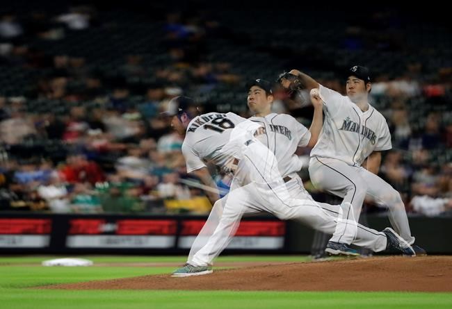 Mariners rally with 2 runs in 10th to beat A’s 6-5 – Winnipeg Free Press