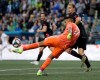 San Jose Earthquakes goalkeeper Daniel Vega makes a drop kick near Seattle Sounders defender Chad Marshall during the first half of an MLS soccer match, Wednesday, April 24, 2019, in Seattle. (AP Photo/Ted S. Warren)
