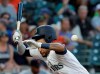 Seattle Mariners' Tim Lopes gets hit by a pitch during the fourth inning of a baseball game against the Detroit Tigers, Thursday, July 25, 2019, in Seattle. Lopes remained in the game. (AP Photo/Ted S. Warren)