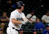Seattle Mariners' Jay Bruce reacts after flying out against the Texas Rangers during the eighth inning of a baseball game, Tuesday, May 28, 2019, in Seattle. The Rangers won 11-4. (AP Photo/Ted S. Warren)