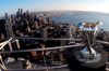 In this Nov. 5, 2019, photo, the MLS Cup trophy is displayed on the roof of the Space Needle with the downtown Seattle in the background. Seattle will host the MLS Cup soccer match Sunday, Nov. 10, 2019, as the Seattle Sounders face Toronto FC at CenturyLink Field. Ten years ago, the arrival of the Sounders changed expectations for what an MLS soccer expansion team should look like, and now the soccer-mad city gets a chance to shine hosting the league's championship game for the second time, but the first with the home team playing. (AP Photo/Ted S. Warren)