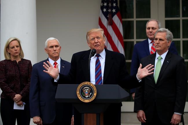President Donald Trump speaks in the Rose Garden of the White House in Washington, after a meeting with Congressional leaders on border security, as the government shutdown continues Friday, Jan. 4, 2019, as Homeland Security Secretary Kirstjen Nielsen, Vice President Mike Pence, House Minority Whip Steve Scalise of La., and House Minority Leader Kevin McCarthy of Calif., listen. (AP Photo/Manuel Balce Ceneta)