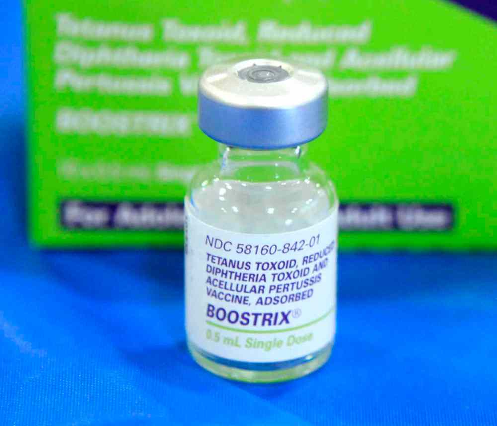 Rich Pedroncelli / The Associated Press
An empty bottle of Tetanus, Diphthera and Pertussis, (whooping cough) vaccine.