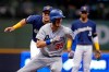 Los Angeles Dodgers' Cody Bellinger (35) is tagged out by Milwaukee Brewers' Hernan Perez after being caught in a rundown between first and second base during the second inning of a baseball game Thursday, April 18, 2019, in Milwaukee. (AP Photo/Aaron Gash)