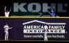 Members of the Milwaukee Brewers' bullpen celebrate in front of Los Angeles Dodgers' Joc Pederson and Alex Verdugo (27) after a home run hit by Milwaukee Brewers' Lorenzo Cain during the fifth inning of a baseball game Sunday, April 21, 2019, in Milwaukee. (AP Photo/Aaron Gash)