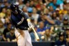 Milwaukee Brewers' Ryan Braun hits a one-run double during the sixth inning of a baseball game against the Pittsburgh Pirates, Saturday, Sept. 21, 2019, in Milwaukee. (AP Photo/Aaron Gash)