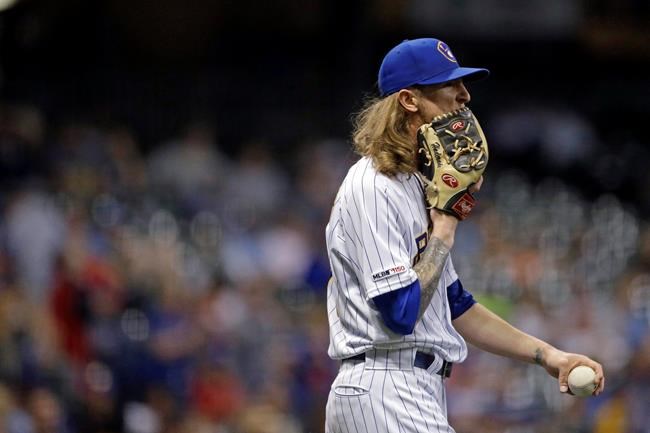 Milwaukee Brewers' Josh Hader reacts after giving up a game-tying solo home run to the Texas Rangers during the ninth inning of a baseball game Friday, Aug. 9, 2019, in Milwaukee. (AP Photo/Aaron Gash)