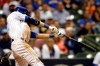 Milwaukee Brewers' Christian Yelich hits a winning RBI-double during the ninth inning of a baseball game against the Chicago Cubs, Saturday, Sept. 7, 2019, in Milwaukee. (AP Photo/Aaron Gash)
