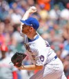 Milwaukee Brewers starting pitcher Brandon Woodruff throws to the Philadelphia Phillies during the first inning of a baseball game Sunday, May 26, 2019, in Milwaukee. (AP Photo/Jeffrey Phelps)