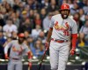 St. Louis Cardinals' Jose Martinez reacts after hitting a foul ball against the Milwaukee Brewers during the first inning of a baseball game Sunday, March 31, 2019, in Milwaukee. (AP Photo/Jeffrey Phelps)