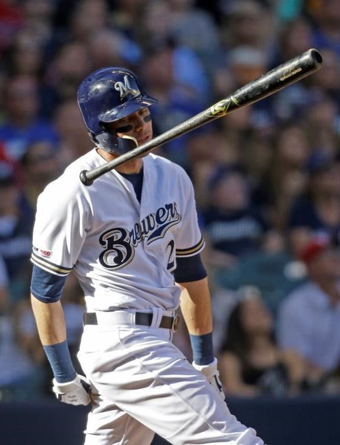 Milwaukee Brewers' Christian Yelich reacts to his fly-out during the seventh inning of a baseball game against the Philadelphia Phillies, Saturday, May 25, 2019, in Milwaukee. (AP Photo/Jeffrey Phelps)