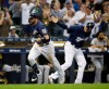 Milwaukee Brewers' Mike Moustakas rounds the bases after his two- run home run against the Pittsburgh Pirates during the eighth inning of a baseball game, Sunday, June 9, 2019, in Milwaukee. (AP Photo/Jeffrey Phelps)