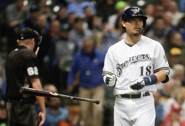 CORRECTS TO FOURTH INNING, INSTEAD OF FIFTH - Milwaukee Brewers' Keston Hiura reacts after striking out during the fourth inning of a baseball game against the Cincinnati Reds Tuesday, May 21, 2019, in Milwaukee. (AP Photo/Morry Gash)