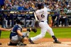 Milwaukee Brewers' Lorenzo Cain hits a home run during the third inning of a baseball game against the San Diego Padres Tuesday, Sept. 17, 2019, in Milwaukee. (AP Photo/Morry Gash)