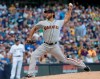 San Francisco Giants starting pitcher Madison Bumgarner throws during the first inning of a baseball game against the Milwaukee Brewers Saturday, July 13, 2019, in Milwaukee. (AP Photo/Morry Gash)