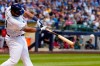 Milwaukee Brewers' Jesus Aguilar hits a double during the fourth inning of a baseball game against the Cincinnati Reds Monday, July 22, 2019, in Milwaukee. (AP Photo/Morry Gash)