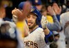Milwaukee Brewers' Ryan Braun celebrates his three-run home run during the third inning of a baseball game against the St. Louis Cardinals Friday, March 29, 2019, in Milwaukee. (AP Photo/Morry Gash)
