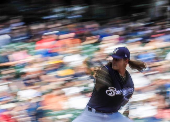 Milwaukee Brewers relief pitcher Josh Hader throws during the eighth inning of a baseball game against the Seattle Mariners Thursday, June 27, 2019, in Milwaukee. (AP Photo/Morry Gash)
