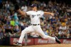 Milwaukee Brewers relief pitcher Brent Suter throws during the sixth inning of a baseball game against the San Diego Padres Tuesday, Sept. 17, 2019, in Milwaukee. (AP Photo/Morry Gash)