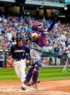 Milwaukee Brewers' Trent Grisham scores past Texas Rangers catcher Jose Trevino during the fourth inning of a baseball game Saturday, Aug. 10, 2019, in Milwaukee. Grisham scored from second on a hit by Mike Moustakas. (AP Photo/Morry Gash)