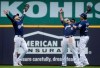 Milwaukee Brewers' Ryan Braun, Lorenzo Cain and Christian Yelich celebrate after a baseball game against the Pittsburgh Pirates Saturday, June 8, 2019, in Milwaukee. The Brewers won 5-3. (AP Photo/Morry Gash)