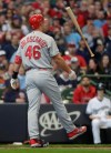St. Louis Cardinals' Paul Goldschmidt flips his bat after striking out during the first inning of an Opening Day baseball game against the Milwaukee Brewers Thursday, March 28, 2019, in Milwaukee. (AP Photo/Morry Gash)
