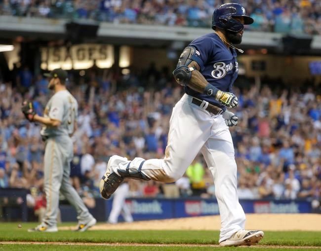 Milwaukee Brewers' Eric Thames hits a home run during the fourth inning of a baseball game against the Pittsburgh Pirates Saturday, June 29, 2019, in Milwaukee. (AP Photo/Morry Gash)