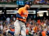 Houston Astros' George Springer reacts after hitting a home run during the 10th inning of a baseball game against the Milwaukee Brewers Monday, Sept. 2, 2019, in Milwaukee. (AP Photo/Morry Gash)