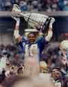 Arlen Redekop / The Canadian Press Files
Winnipeg Blue Bombers Rod Hill holds the CFL Grey Cup after defeating Edmonton Eskimos 50-11 in Vancouver on Nov. 25, 1990.