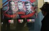 Fred Chartrand / The Canadian Press
A man looks at the exhibit of The Victoria Cross Medals of recipients Corporal Lionel Clarke, Sergeant Major Frederick Hall and Lieutenant Robert Shankland  displayed at the National War Museum in Ottawa.