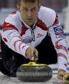 JONATHAN HAYWARD/ the Canadian Press
Canada's skip Jeff Stoughton makes a shot during a draw against Norway.
