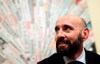 FILE - In this file photo dated Wednesday, March 28, 2018, Roma sports director Ramon Rodriguez Verdejo, known as Monchi, talks to journalist during a press conference in Rome. Sevilla said Sunday March 17, 2019, former sports director Roman ‚ÄúMonchi‚Äù Rodriguez, the man credited with building several title-winning squads, is returning to his old job. (AP Photo/Andrew Medichini, FILE)