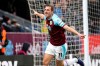 Burnley's Chris Wood celebrates scoring his side's first goal of the game against West Ham United, during their English Premier League soccer match at Turf Moor in Burnley, Sunday Dec. 30, 2018. (Richard Sellers/PA via AP)