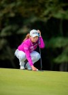 Korea's Mi Hyang Lee lines up her putt on the 16th hole, on the way to an 8 under par round, during day one of the Ladies Scottish Open golf tournament at The Renaissance Club, North Berwick, Scotland, Thursday Aug. 8, 2019. (Kenny Smith/PA via AP)