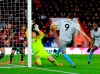 West Ham United's Andy Carroll, right, misses a chance to score during the match against Bournemouth during their English Premier League soccer match at The Vitality Stadium in Bournemouth, England, Saturday Jan. 19, 2019. (Mark Kerton/PA via AP)