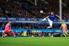 Everton's Gylfi Sigurdsson tries to controla shot on goal against Manchester City during their English Premier League soccer match at Goodison Park in Liverpool, England, Saturday Sept. 28, 2019. (Peter Byrne/PA via AP)