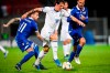 Liechtenstein's Dennis Salanovic, left, and Robin Gubser, right, play against Italy's Nicolo Zaniolo, center, during their Euro 2020 Qualifying, Group J soccer match between Liechtenstein and Italy, in Vaduz, Liechtenstein, on Tuesday, Oct. 15, 2019. (Gian Ehrenzeller/Keystone via AP)