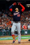 Washington Nationals' Juan Soto celebrates in the dugout after his home run against the Houston Astros during the fourth inning of Game 1 of the baseball World Series Tuesday, Oct. 22, 2019, in Houston. (AP Photo/Matt Slocum)