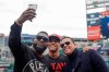 Alex Rodriguez and David Ortiz take a selfie with Washington Nationals' Juan Soto before Game 3 of the baseball World Series against the Houston Astros Friday, Oct. 25, 2019, in Washington. (AP Photo/Pablo Martinez Monsivais)
