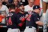 Washington Nationals manager Dave Martinez has to be restrained after being ejected for arguing an interference call during the seventh inning of Game 6 of the baseball World Series against the Houston Astros Tuesday, Oct. 29, 2019, in Houston. (AP Photo/David J. Phillip)