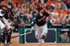Washington Nationals' Kurt Suzuki hits a home run during the seventh inning of Game 2 of the baseball World Series against the Houston Astros Wednesday, Oct. 23, 2019, in Houston. (AP Photo/David J. Phillip)