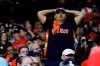 A fan watches during the ninth inning of Game 6 of the baseball World Series between the Houston Astros and the Washington Nationals Tuesday, Oct. 29, 2019, in Houston. (AP Photo/David J. Phillip)