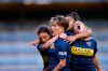 Boca Juniors' Yamila Rodriguez, center, celebrates with teammates after scoring in the Superliga women's soccer tournament in Buenos Aires, Argentina, on Saturday, March 9, 2019. The women competed in one of Argentina's most famous stadiums on Saturday, a milestone for the female players who are fighting for the same rights as male soccer players in the country's most popular sport. (AP Photo/Natacha Pisarenko)
